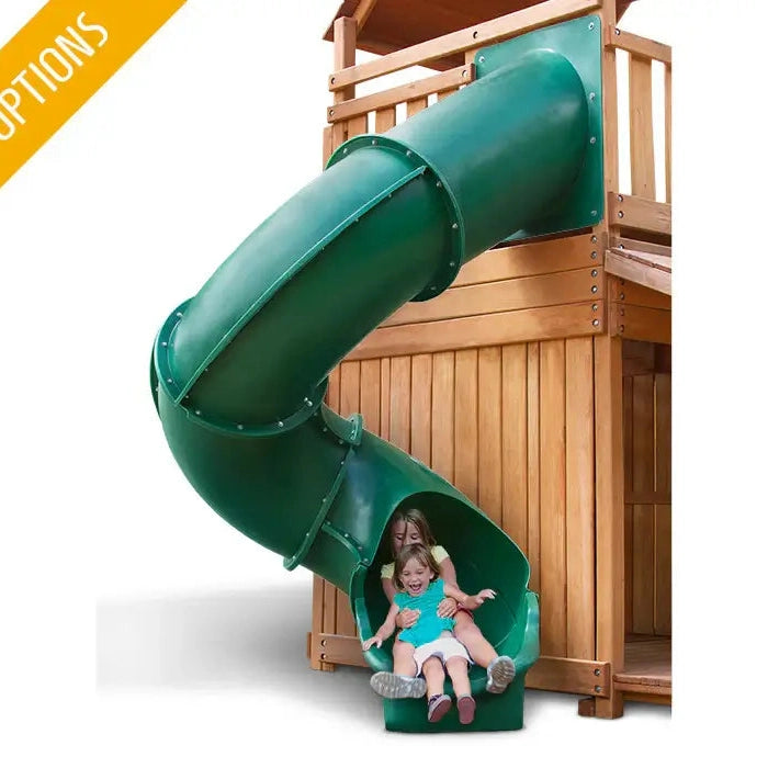 2 girls laughing as they come out the bottom of a tube slide