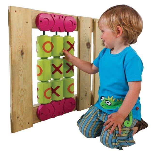 child playing with the playground green and pink tic tac toe set in nz