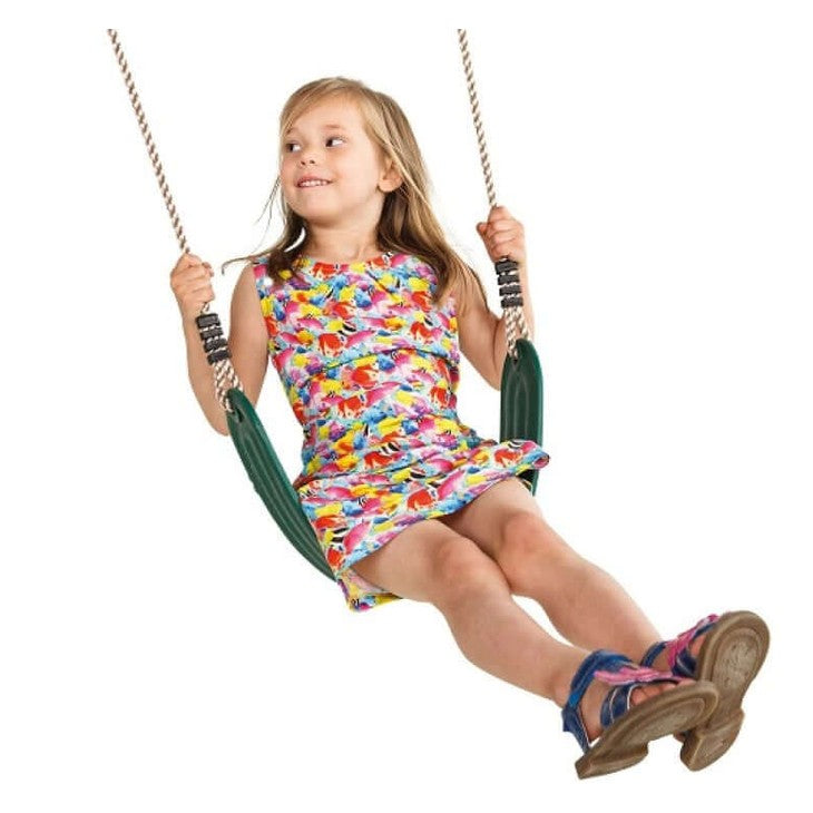 girl swinging on green flexible belt swing