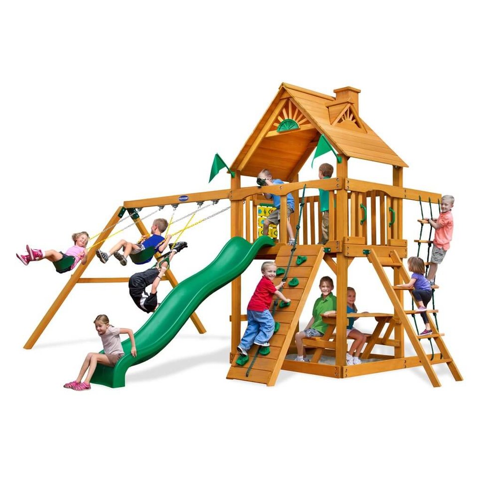 Children playing on a wooden kitset playground