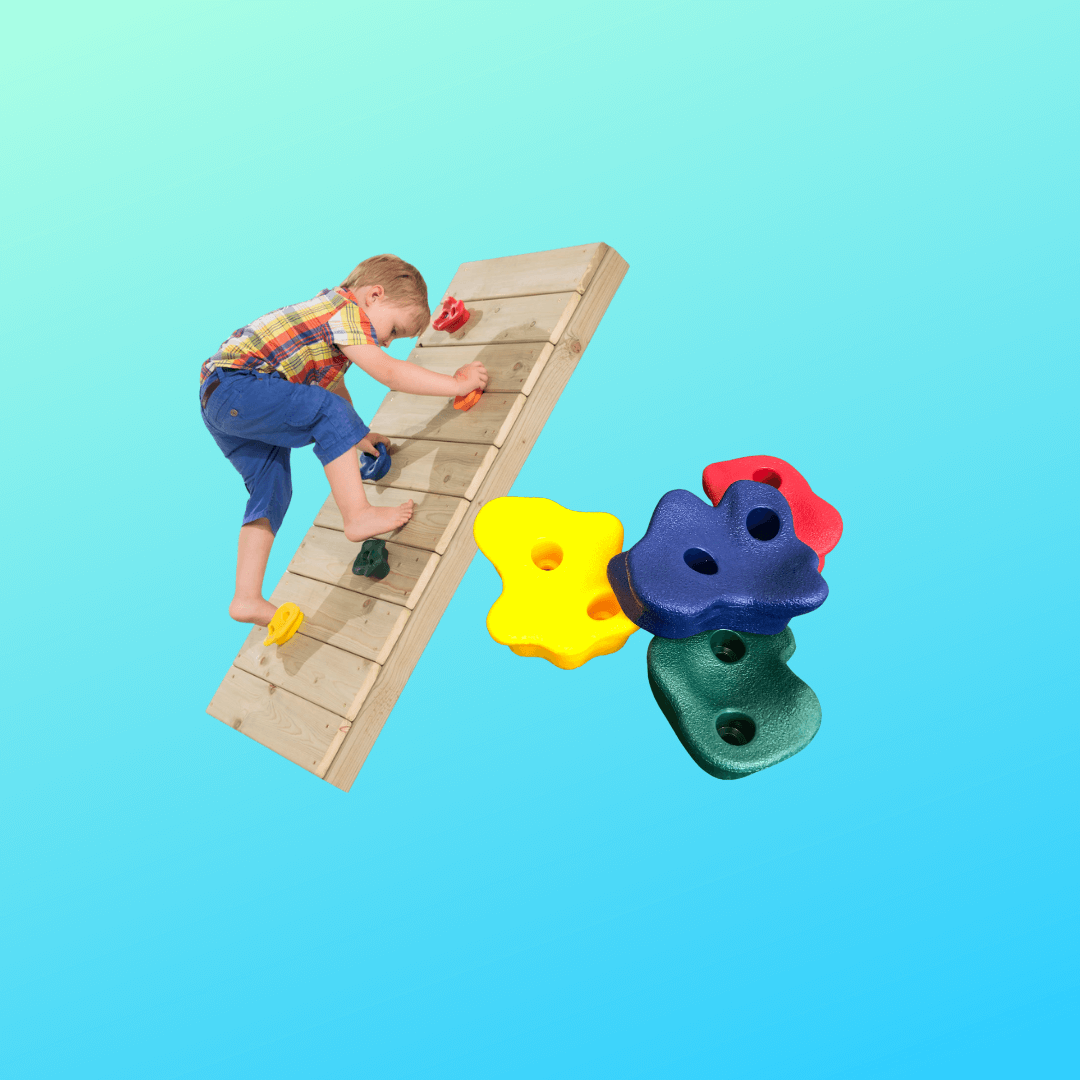 child climbing up plastic rock holds on limbing wall. Red, yellow, blue, green colour options
