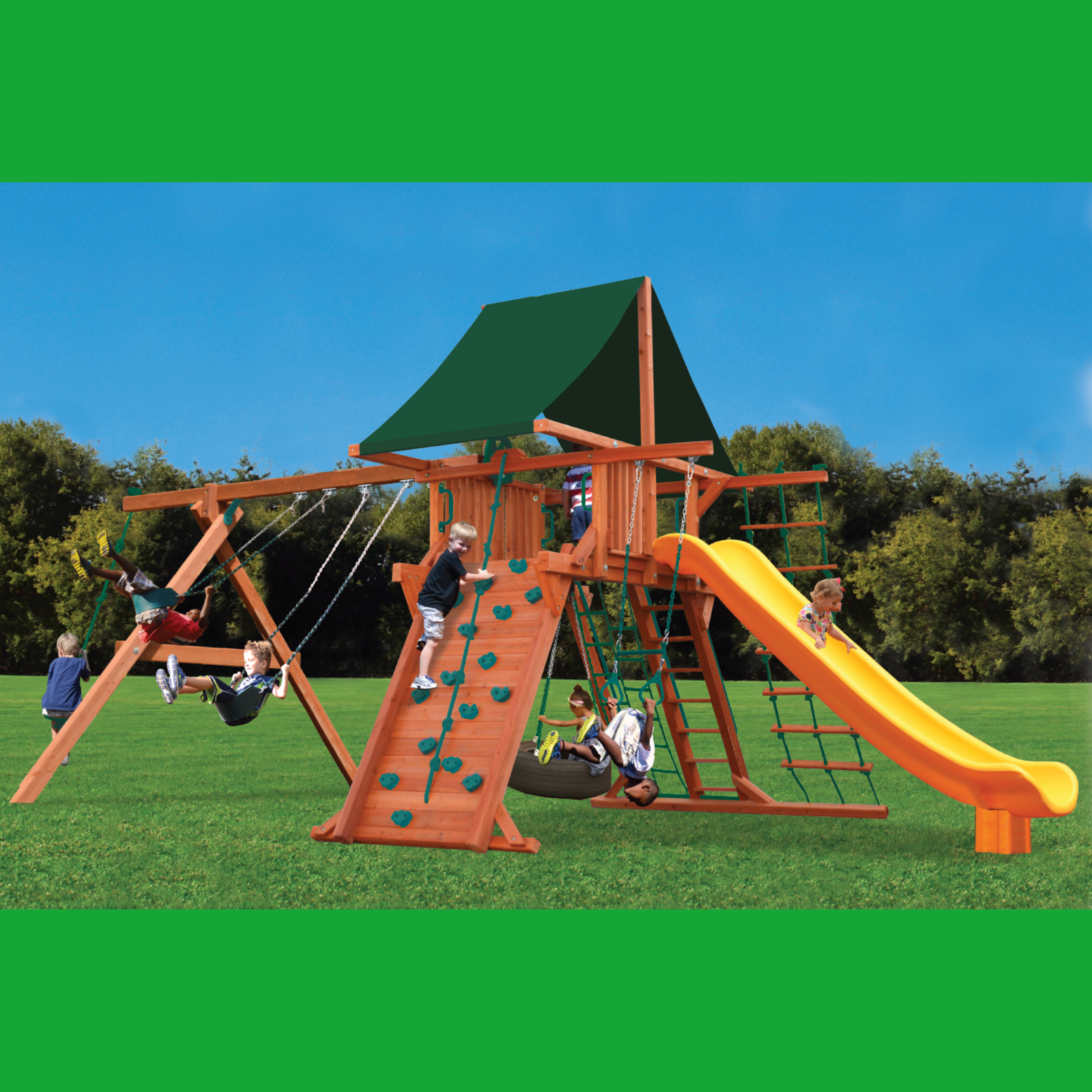 Children playing on a wooden playground set with a green roof and yellow slide.