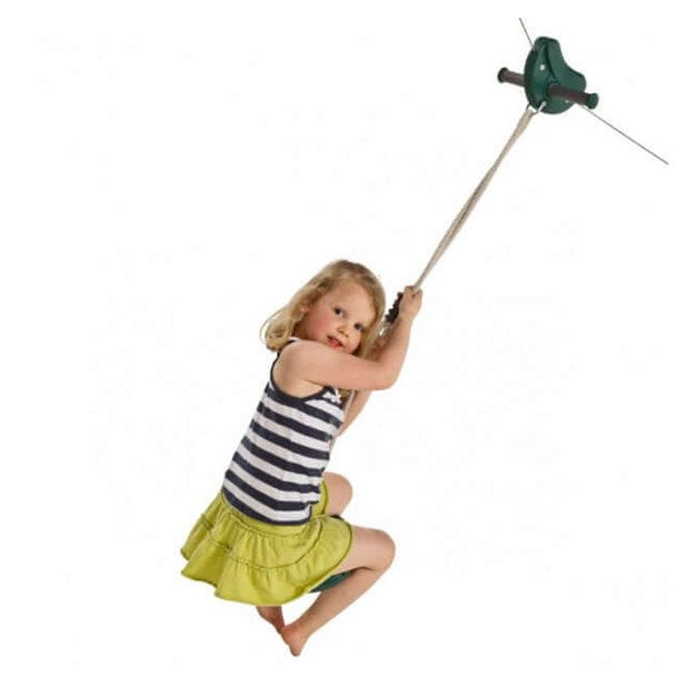 girl sitting on a disc swing under a flying fox going down the zip line.