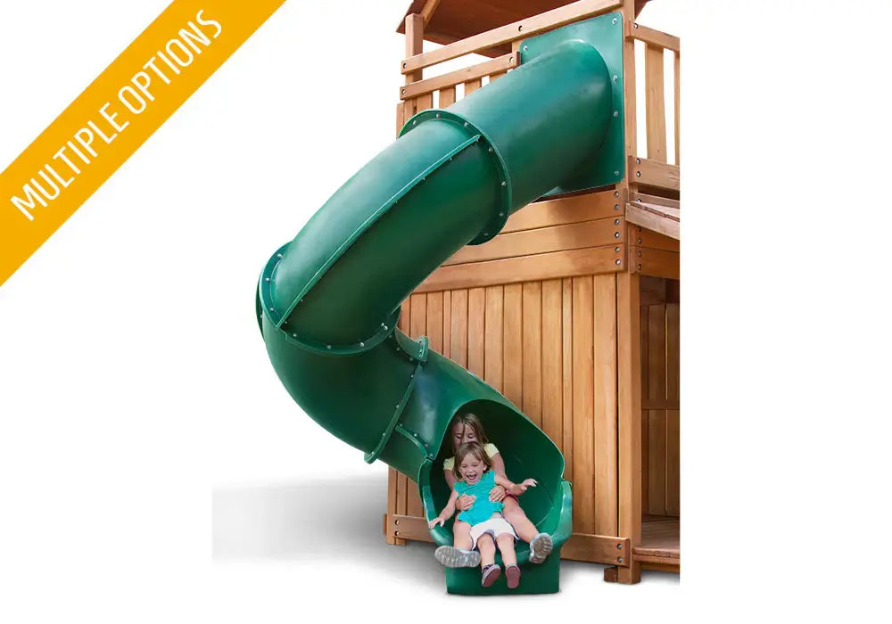 2 girls laughing as they come out the bottom of a tube slide