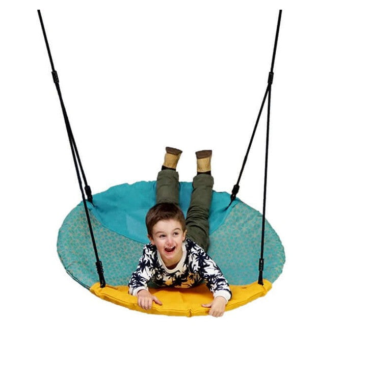 child swinging on a turquiose and yellow winkoh nest swing