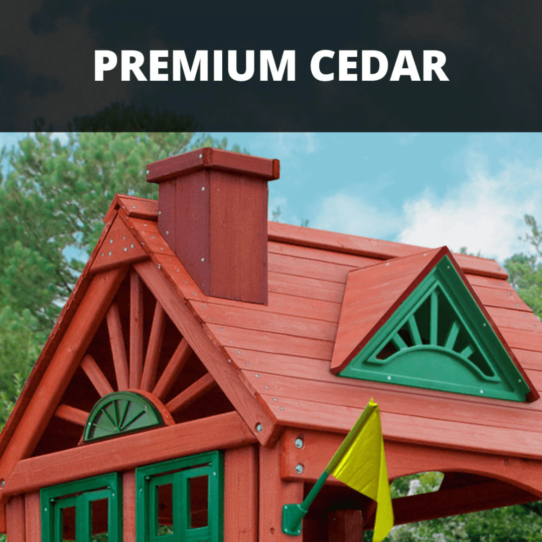 Wooden playhouse with red roof and green accents against a natural background