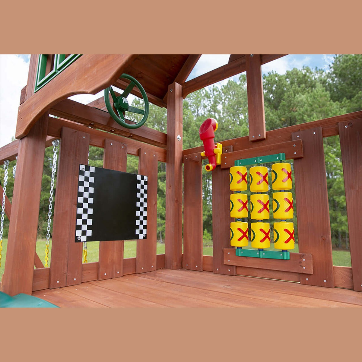 Wooden playground with climbing wall and interactive elements in nz backyard