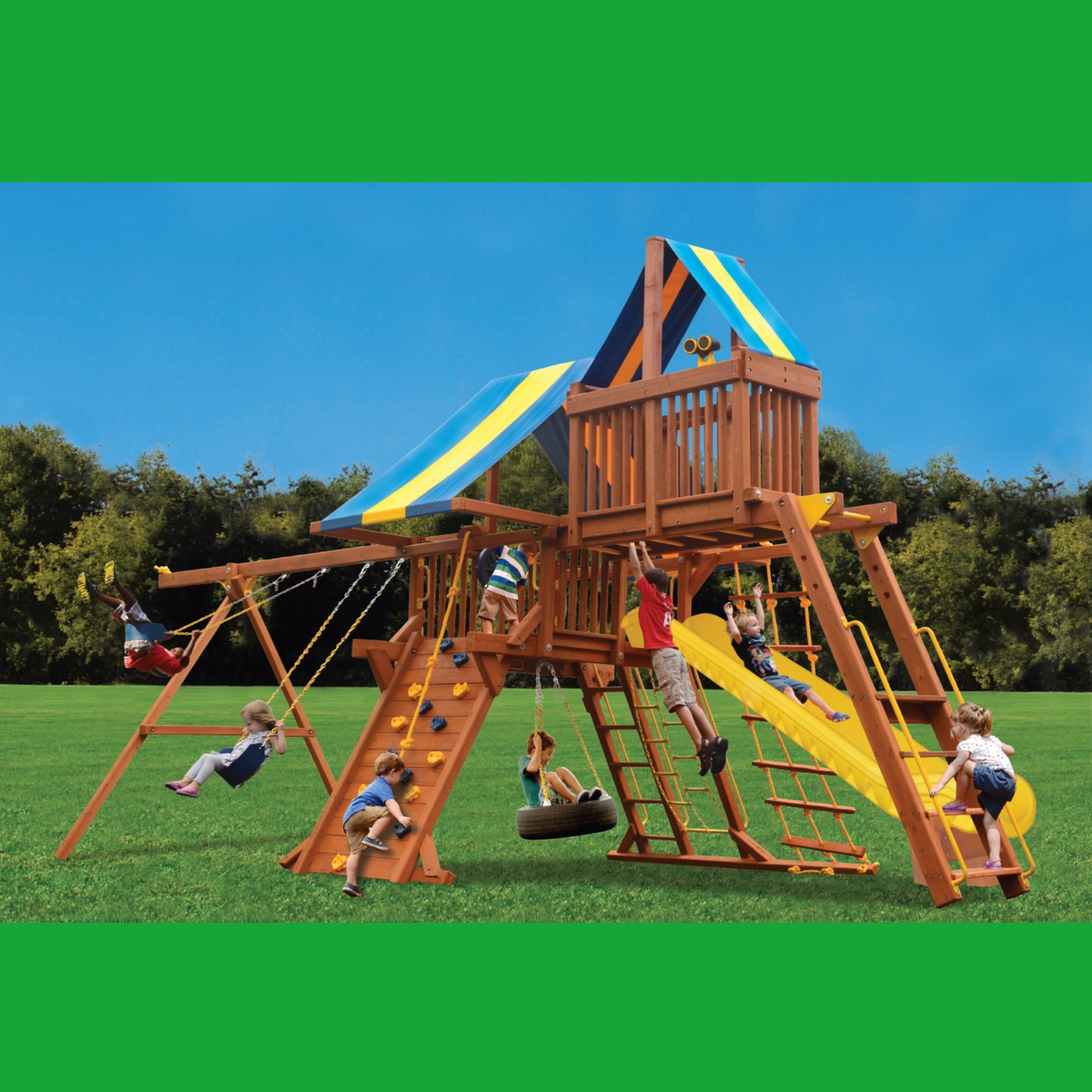 Children playing on a wooden playground set with swings, slides, and climbing structures.