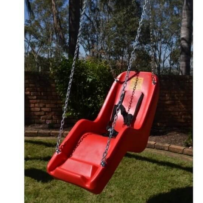 red jennswing on swing frame in nz backyard