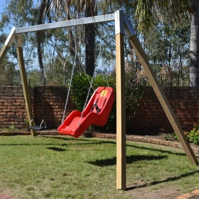 reg jennswing in backyard on swing frame
