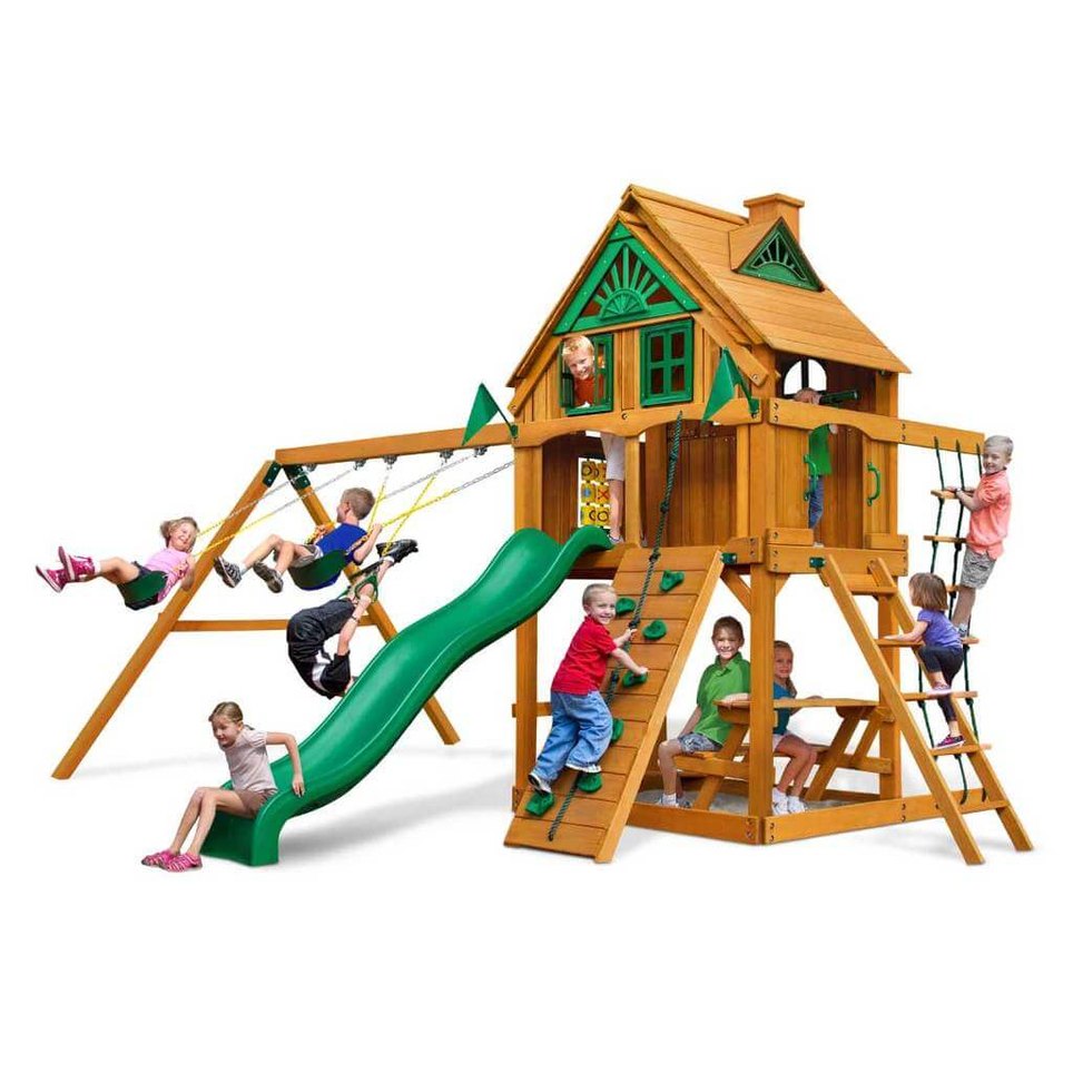 kids playing on a kereru wooden outdoor playground in nz