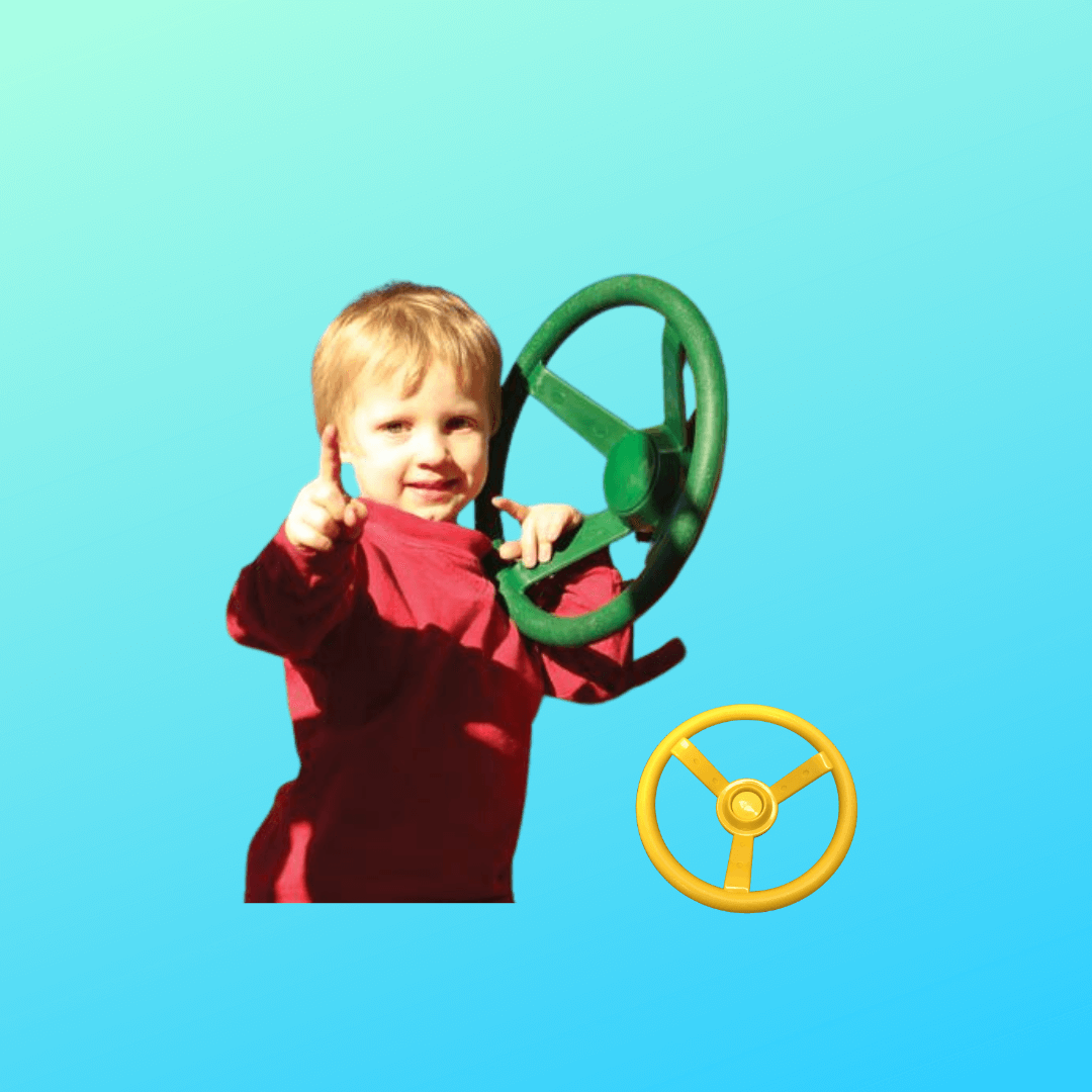 child playing with green steering wheel, also yellow steering wheel in background
