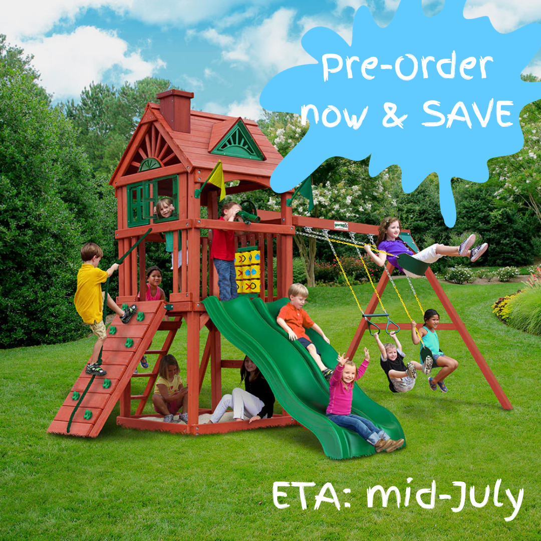 children playing on wooden playground with slides and swings