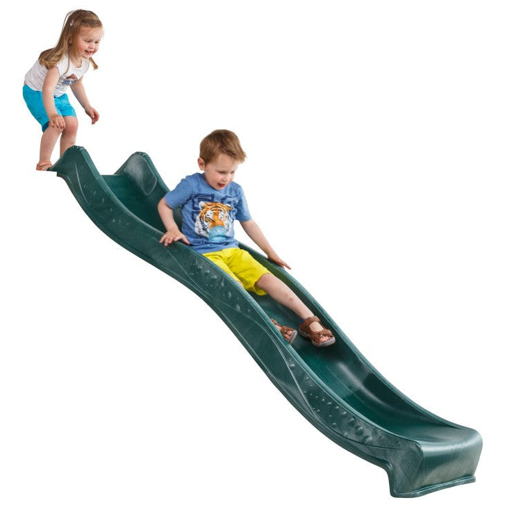 2 kids happily sliding down a green slide