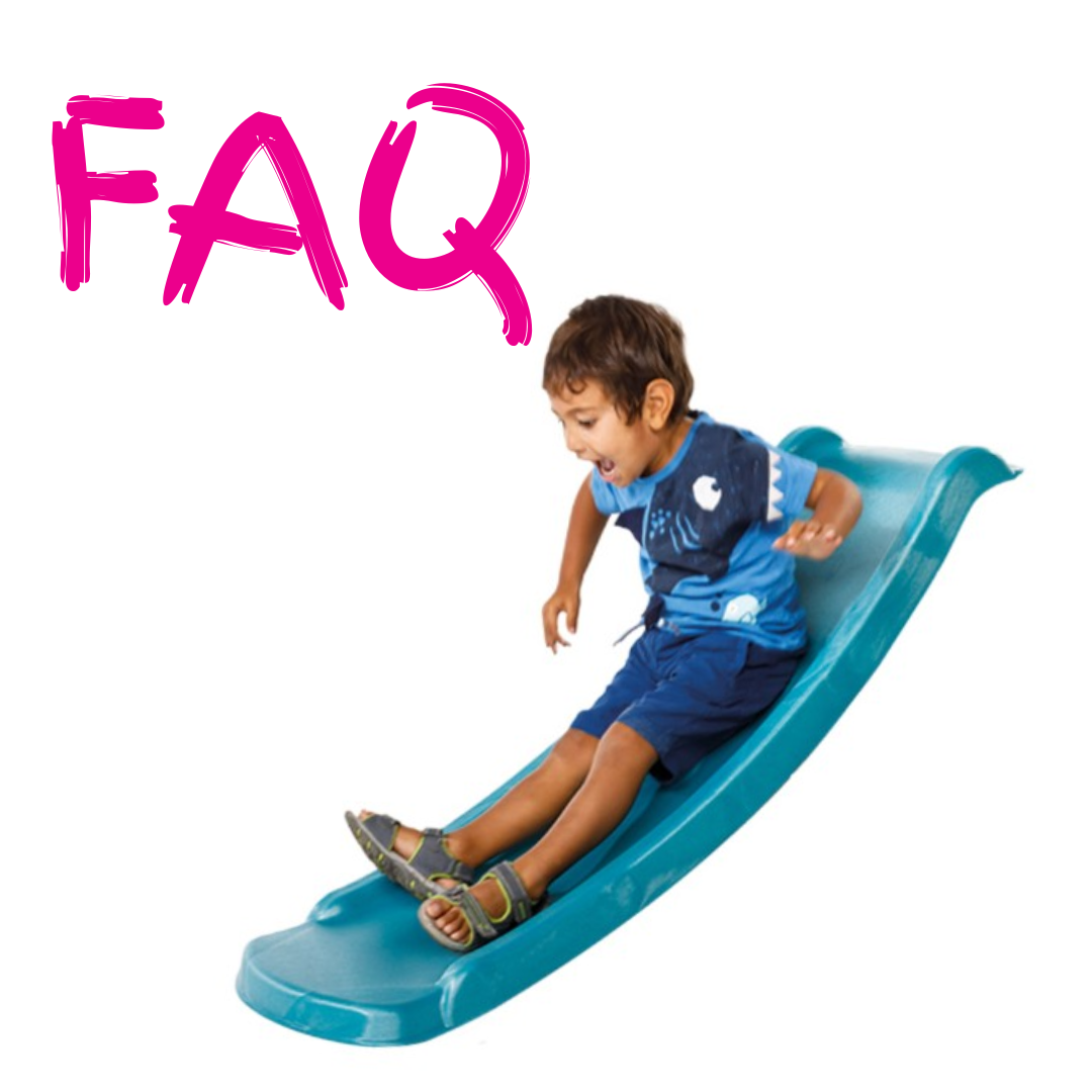 Child sliding down a blue slide 