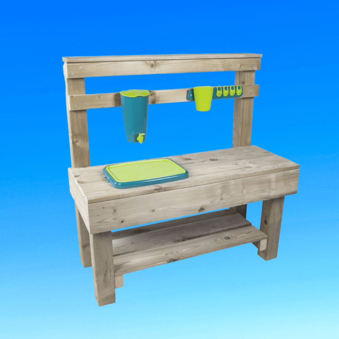 wooden bench with mud kitchen accessories in