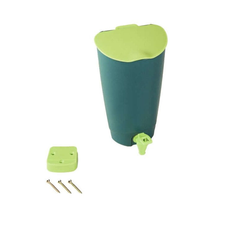 Green and teal plastic container with tap for mud kitchen.