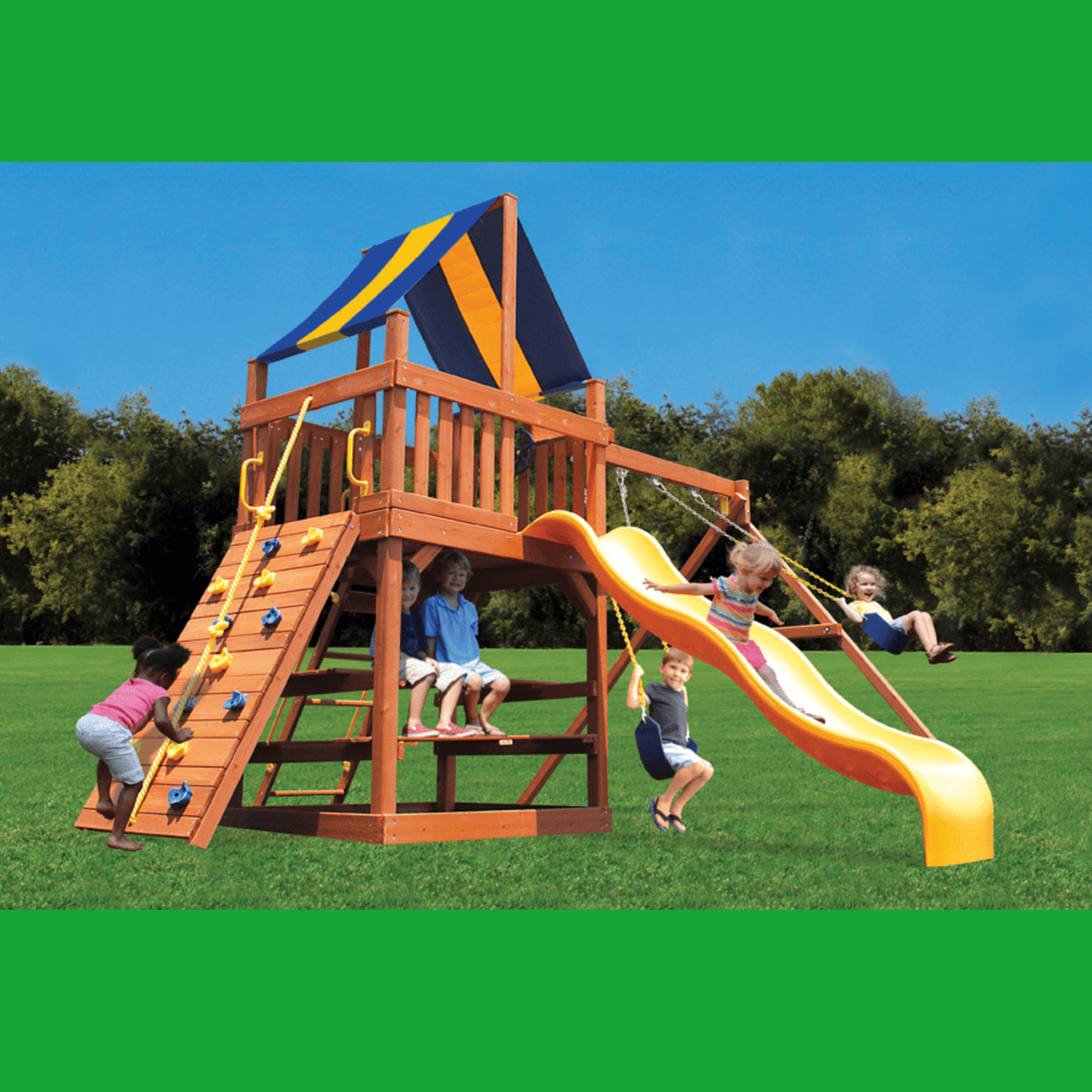 A wooden outdoor playset with a climbing ladder, elevated platform, yellow slide, and blue-and-yellow canopy, shown on a grassy lawn with children playing under a blue sky.