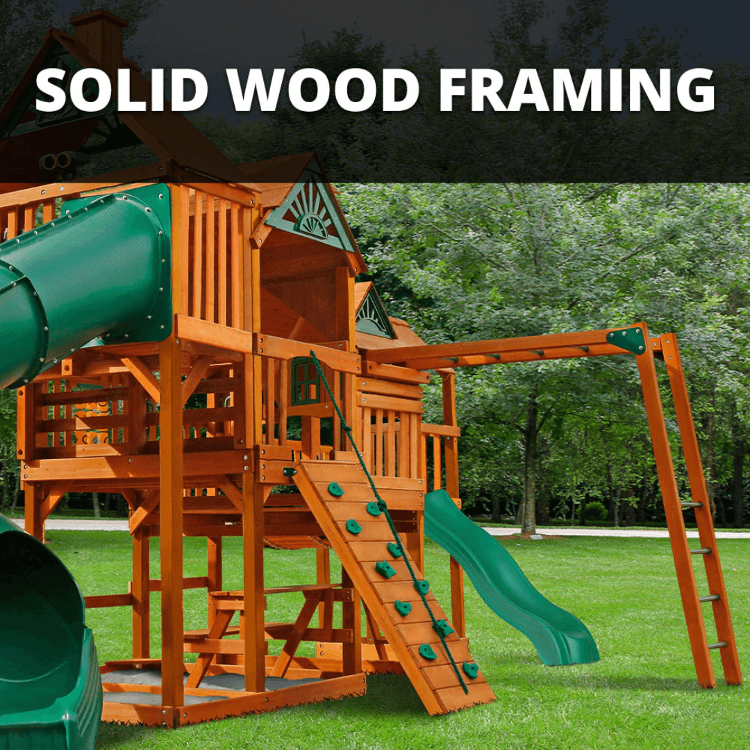 Wooden playground structure with green slides and solid wood framing, set against a natural background.