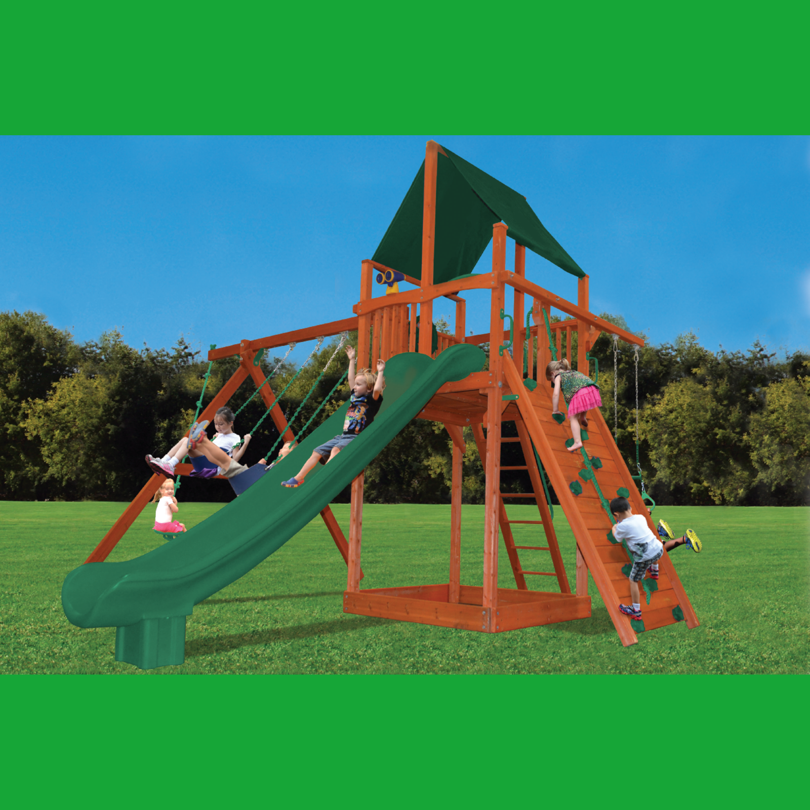 Children playing on a wooden playground set with green slide and red climbing structure.