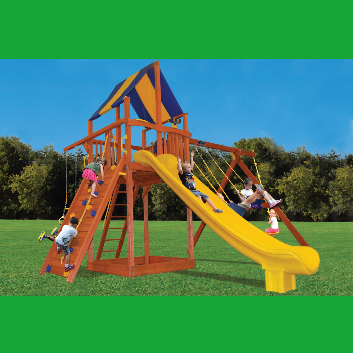 Children playing on a wooden playground set with a yellow slide and blue and yellow roof in an outdoor setting.