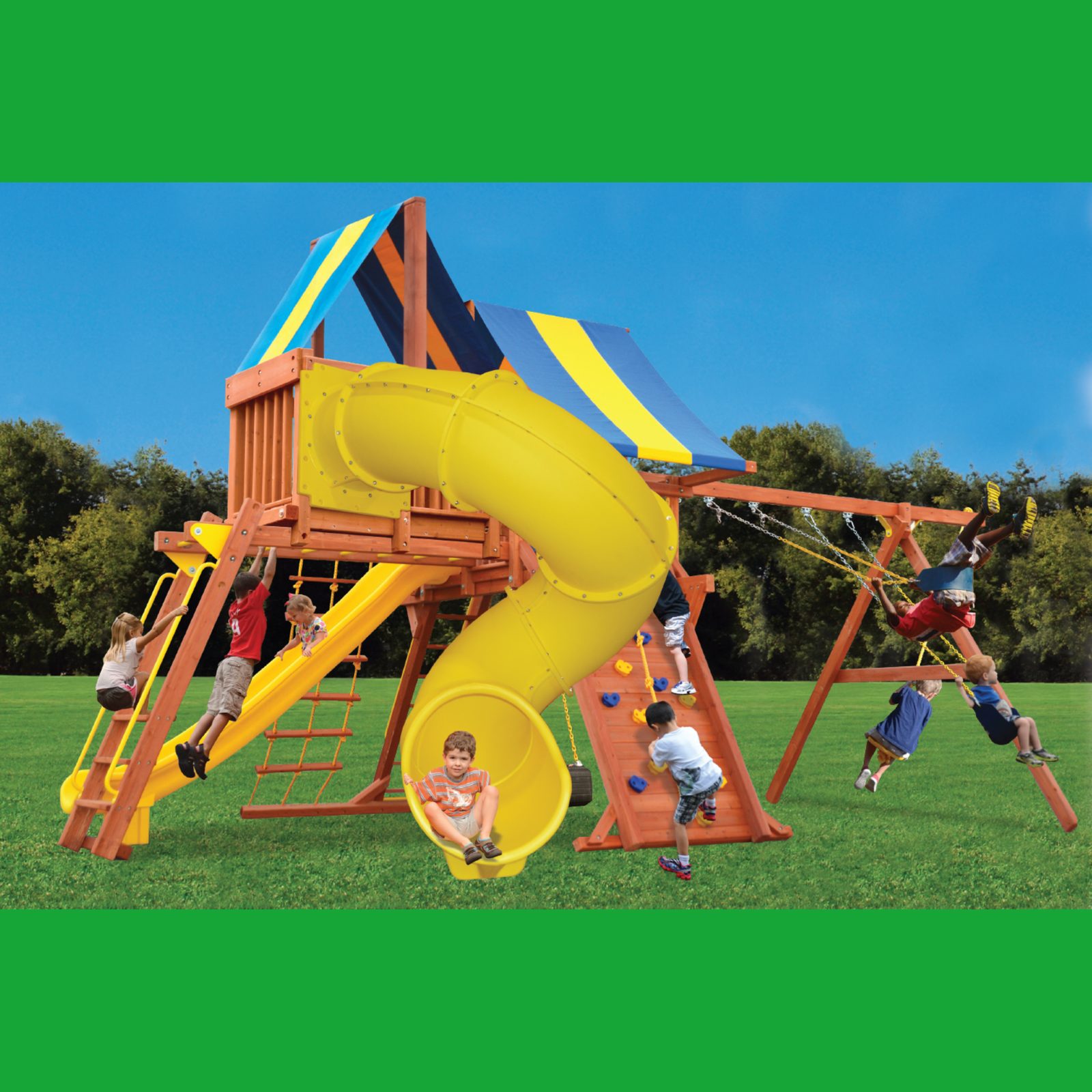 Children playing on a colorful playground set with a yellow slide and blue and yellow striped roof.