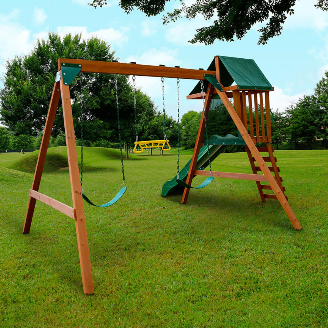 Wooden playground set with swings and slide in nz backyard