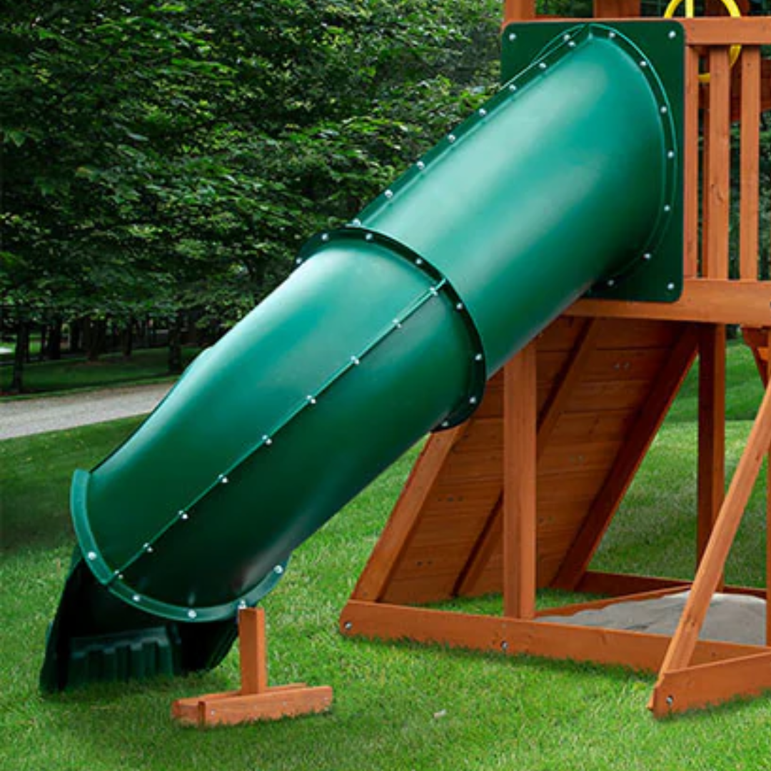 green tube slide on a wooden outdoor playground in backyard