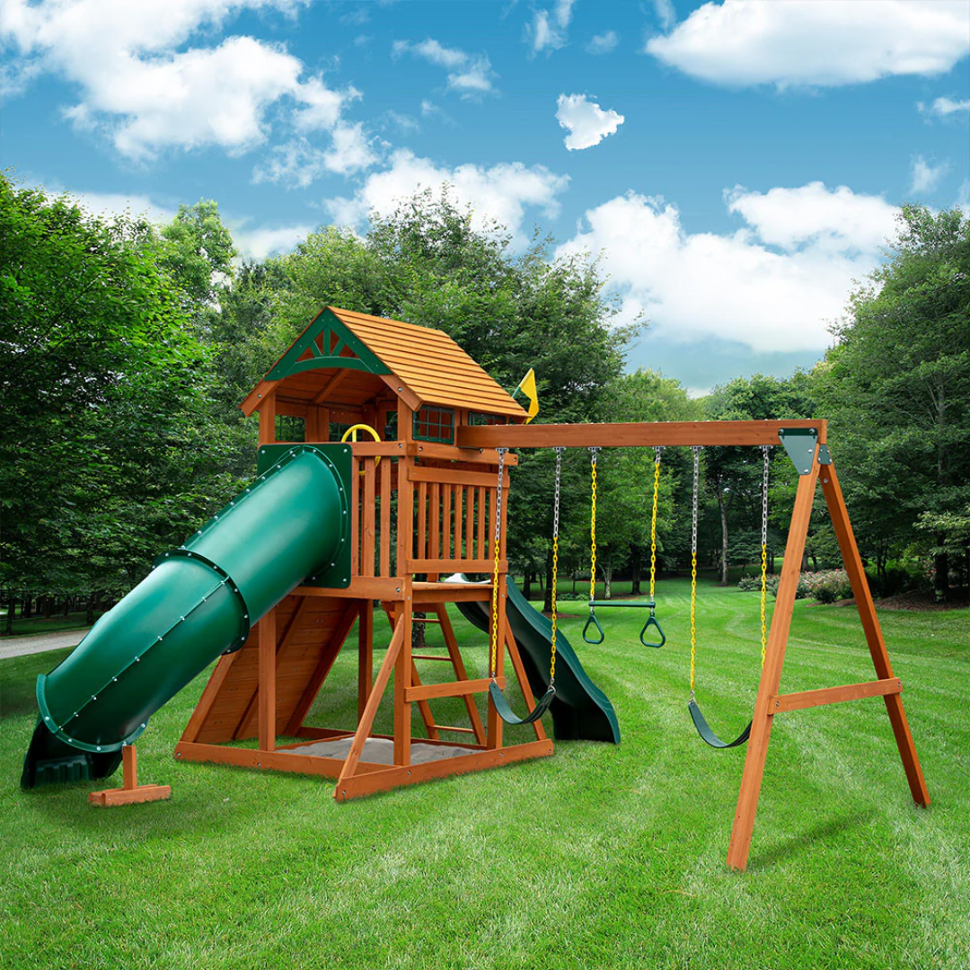 tube slide on a wooden playground with swings